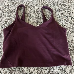 Like New Lululemon Mullberry color Crop Top. Built in bra. Size 6